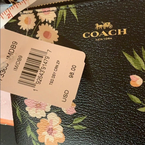 Coach | “Daisies” zipper Wristlets - Picture 8 of 8